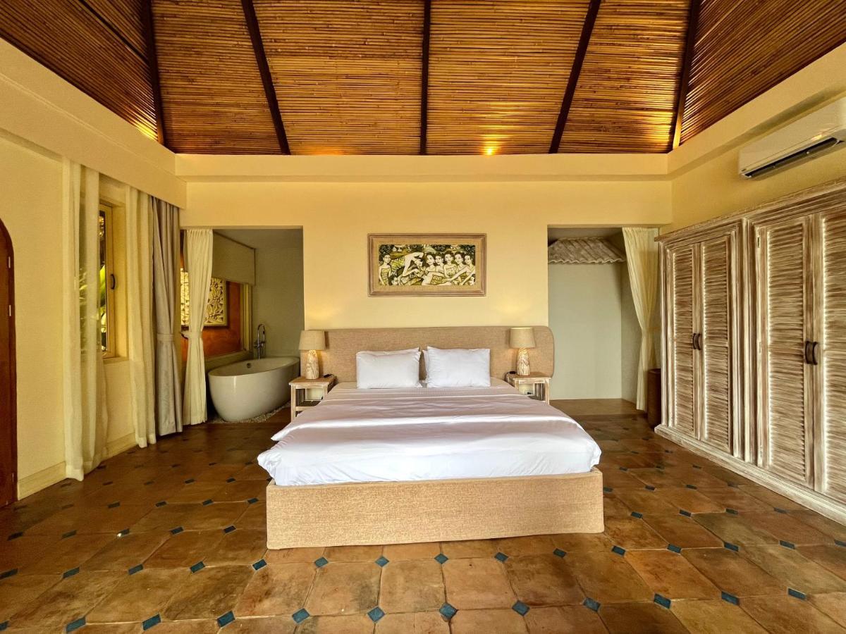 Coco Grove Beach Resort, Siquijor Island Exterior foto A bedroom at the resort