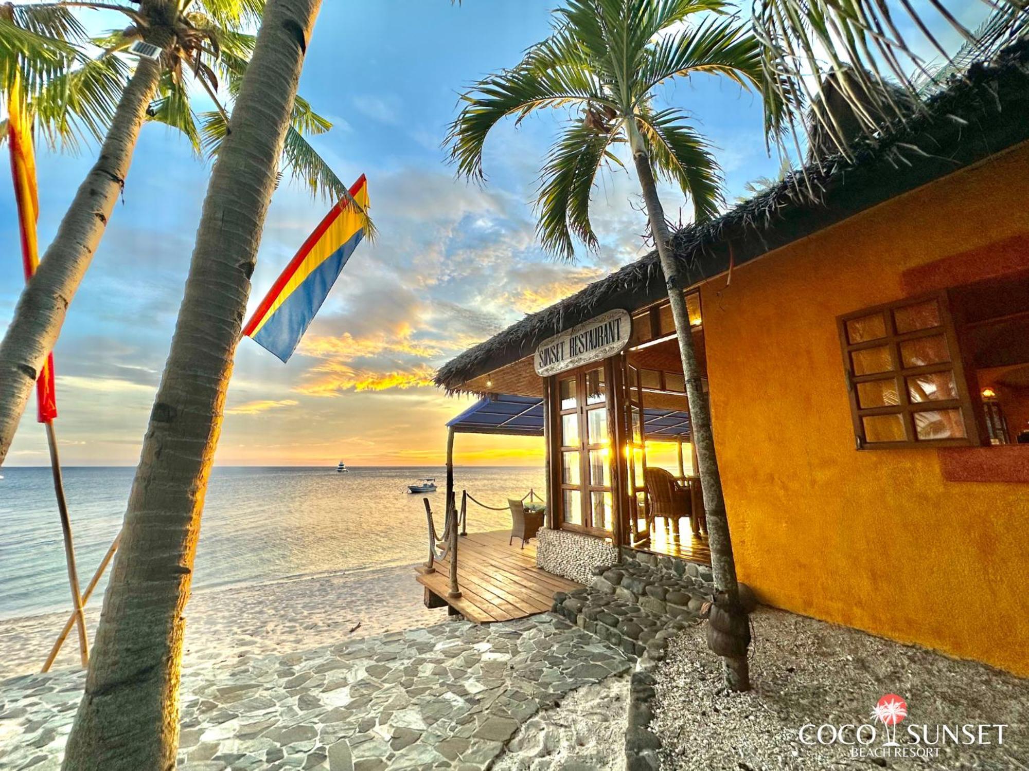 Coco Grove Beach Resort, Siquijor Island Exterior foto Sunset at the beach